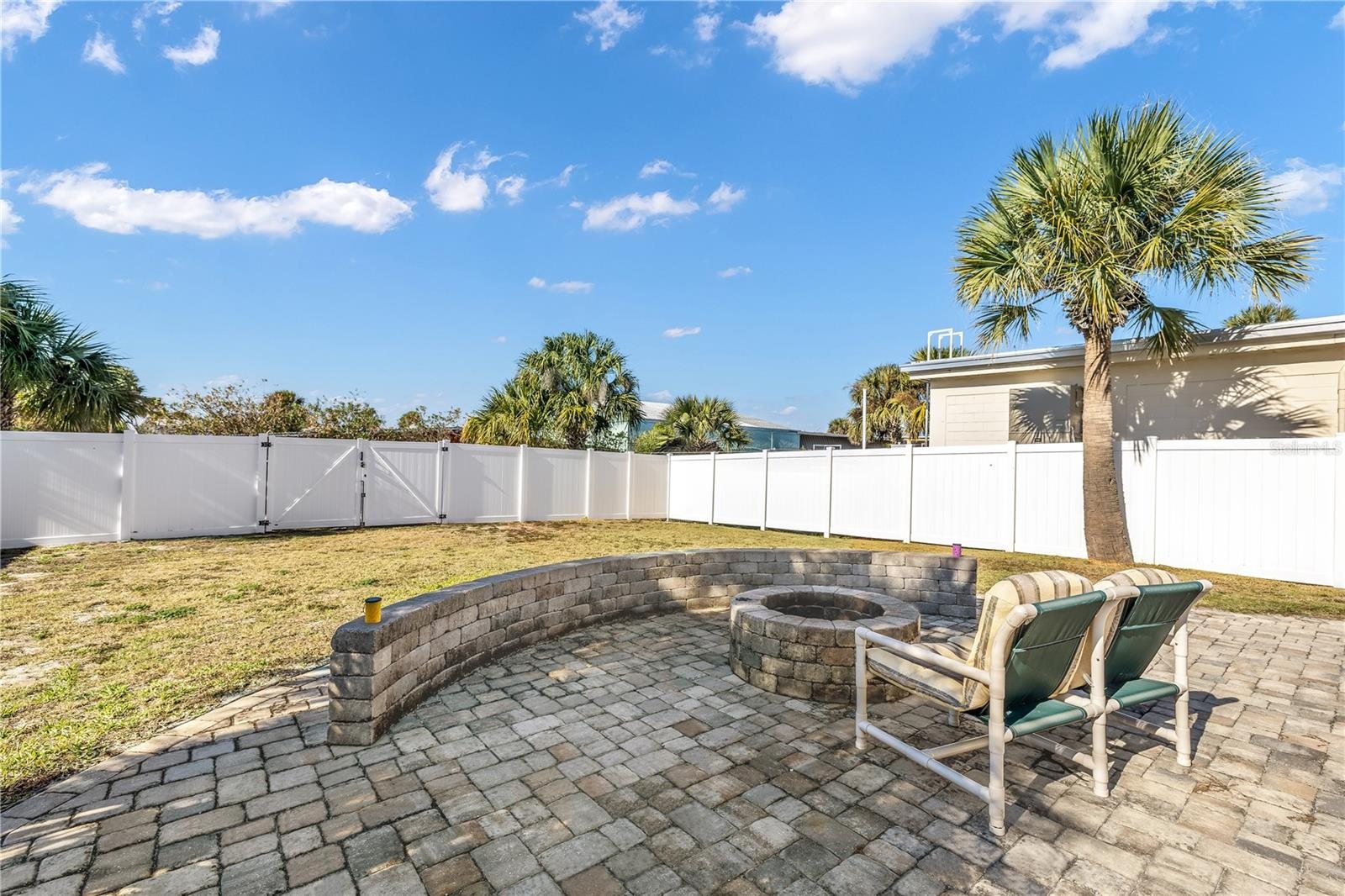 Shared paver patio and fire pit