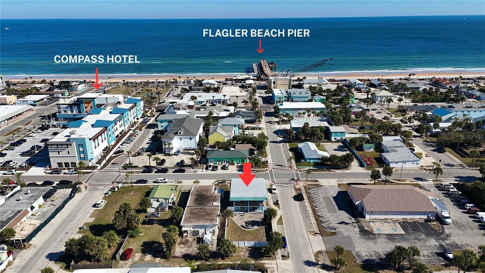 Across from the Compass Hotel, two blocks from the pier